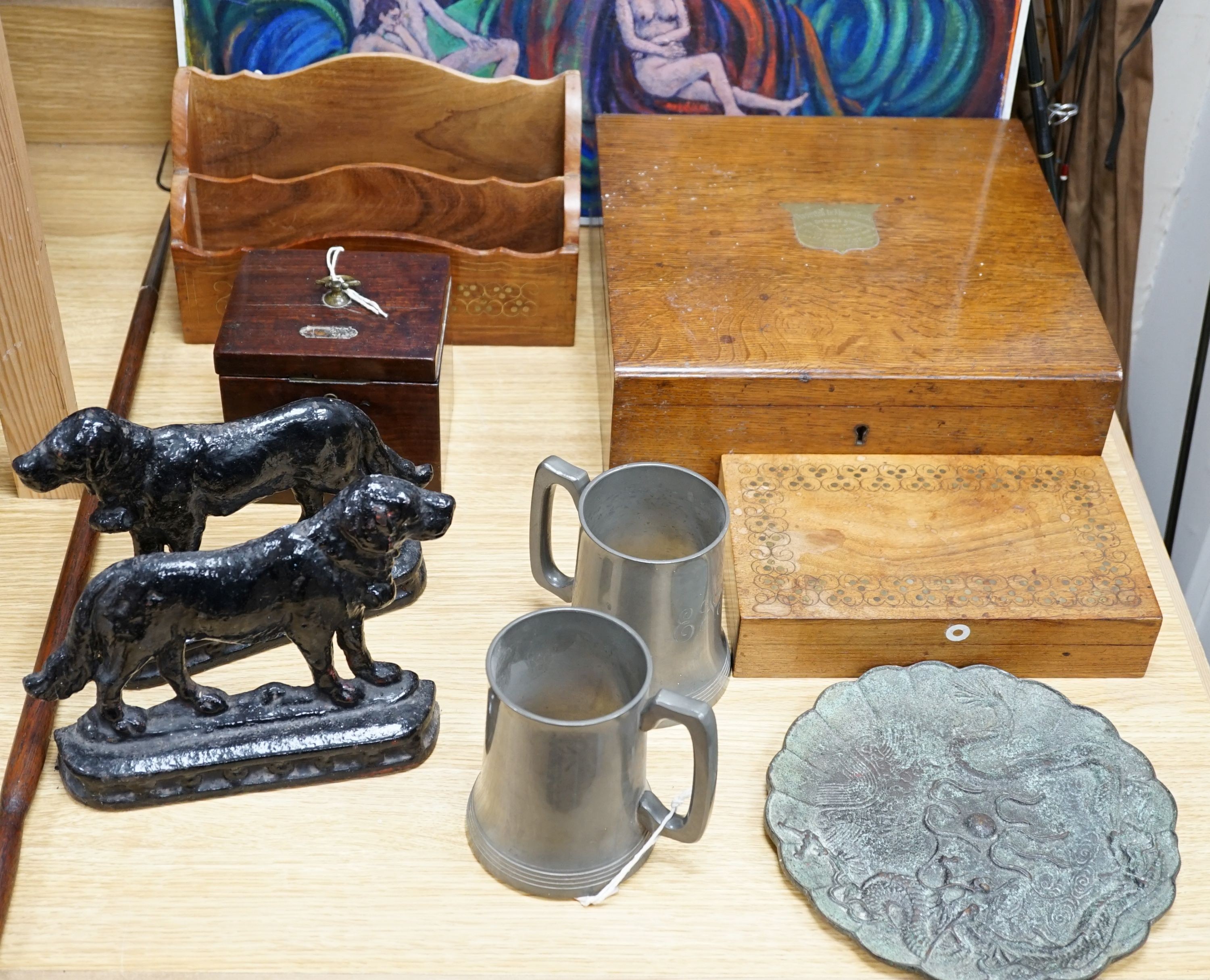 A Georgian square mahogany tea caddy, a brass inlaid hardwood stationary rack and box, and sundry items